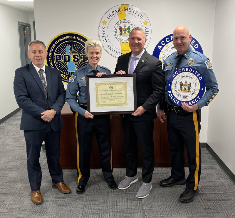 On hand for the official Dewey Beach Police Department accreditation presentation are (l-r) POST Executive Director Sean E. Moriarty, Dewey Beach Police Chief Constance Speake, DSHS Secretary Joshua Bushweller and DBPD Lt. Clifford Dempsey. SUBMITTED PHOTOS